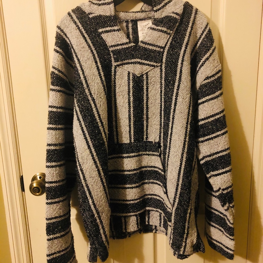 Spanish style sweater pull over, lightly warn